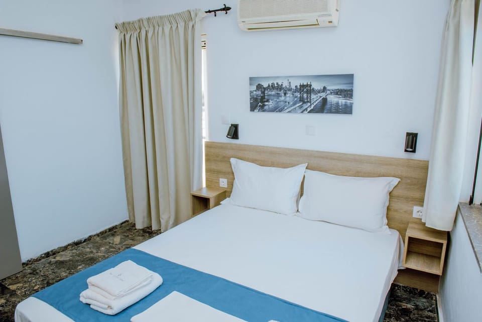 Bed, Photo of the whole room, Bedroom, towels, air conditioner