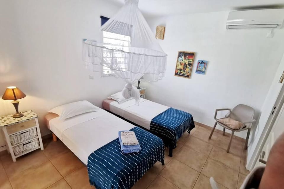 Bed, Photo of the whole room, Bedroom, towels, air conditioner