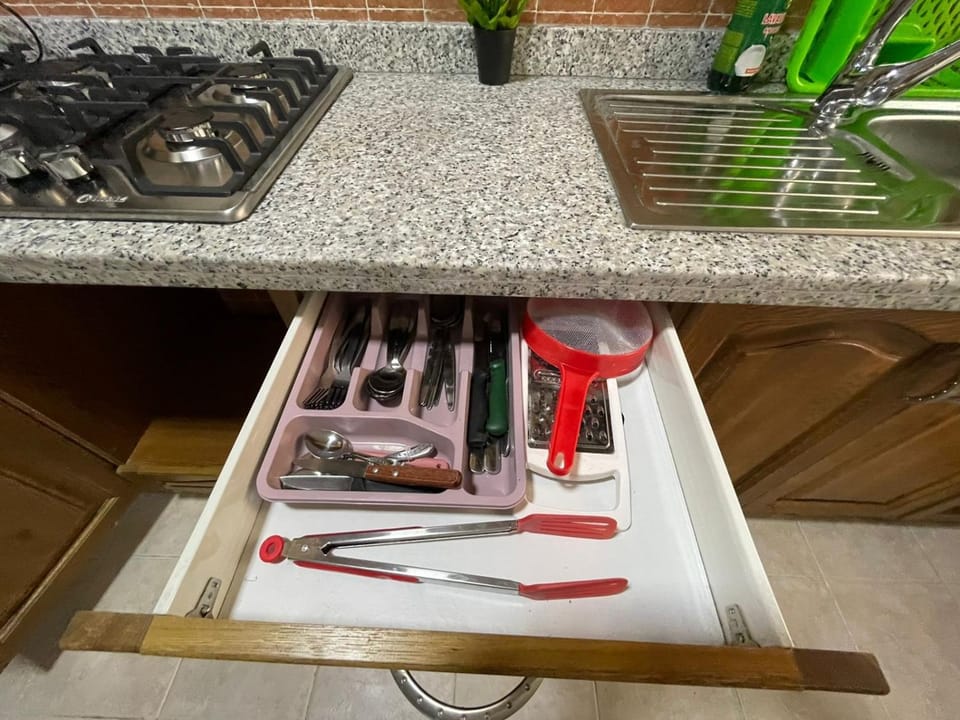 Kitchen or kitchenette, stove