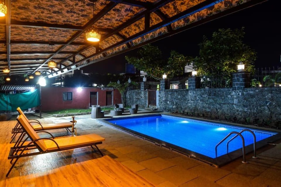 Property building, Night, Pool view, Swimming pool, Swimming pool, sunbed