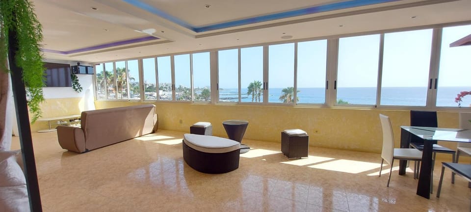 Natural landscape, Living room, Seating area, Sea view