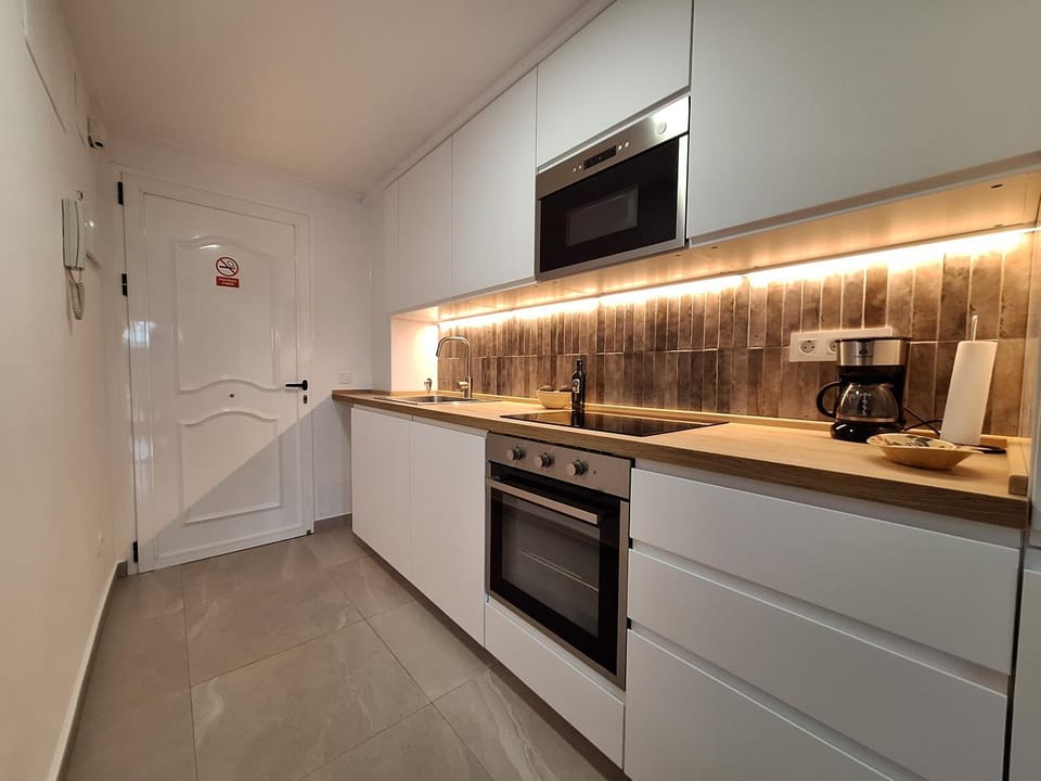 microwave, oven, stove, washing machine, kitchen