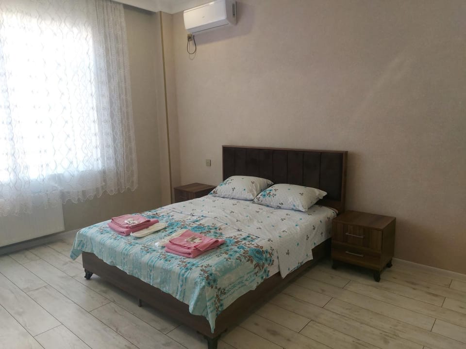 Bedroom, towels, air conditioner