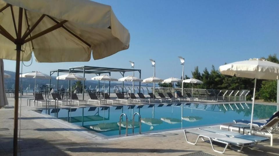 Property building, Day, Pool view, Swimming pool