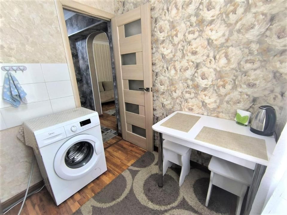 Kitchen or kitchenette, washing machine