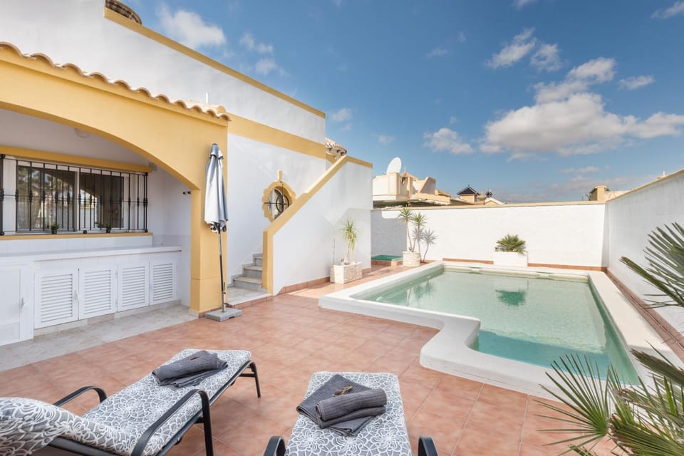 Property building, Living room, Swimming pool