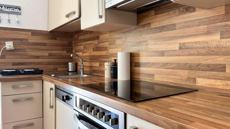 Kitchen or kitchenette, stove