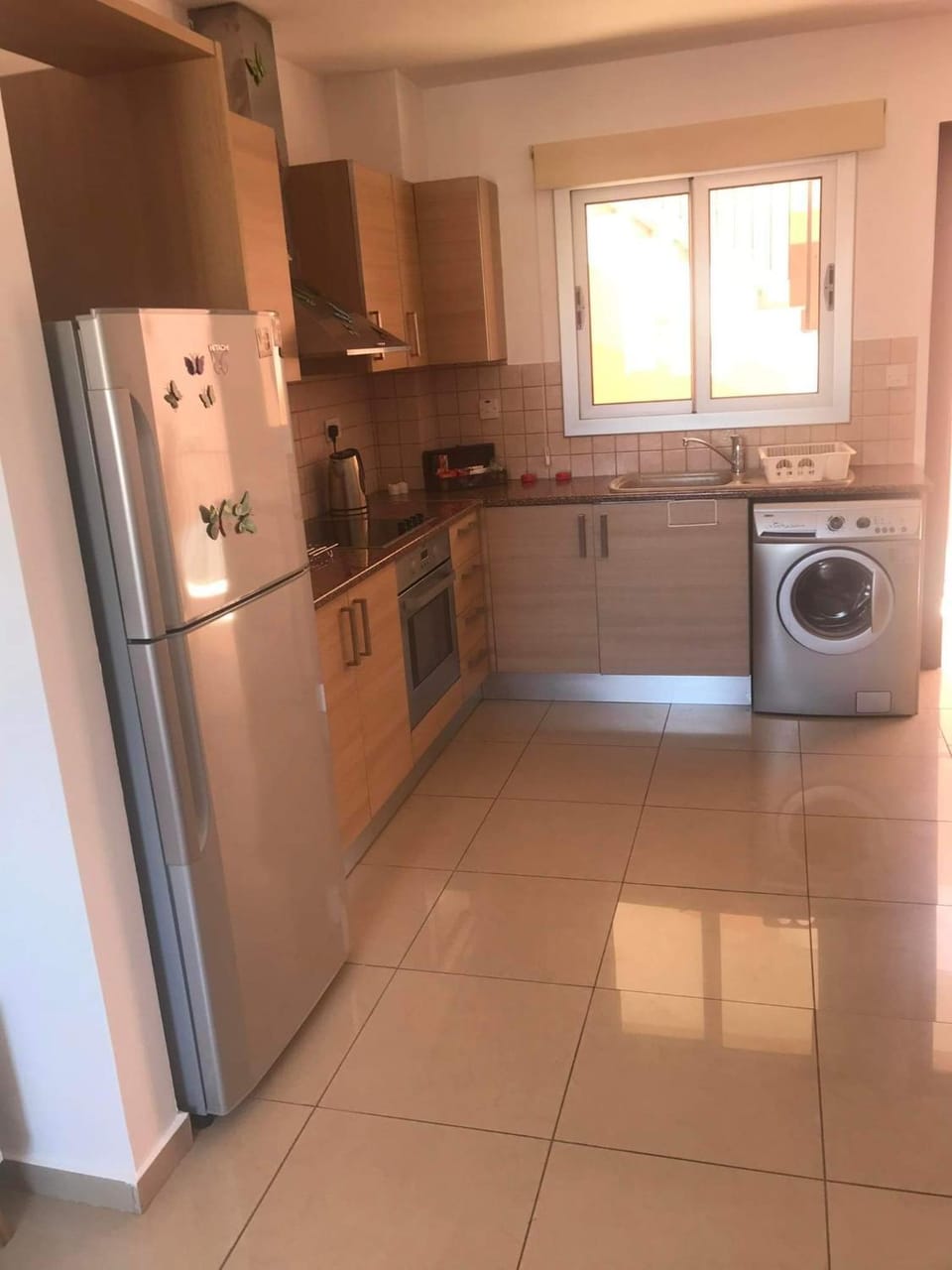 Kitchen or kitchenette, washing machine