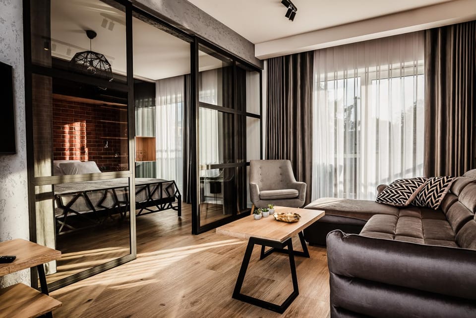 Bed, Living room, Seating area, Bedroom