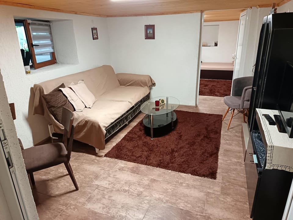 Bed, Living room, Seating area, Bedroom