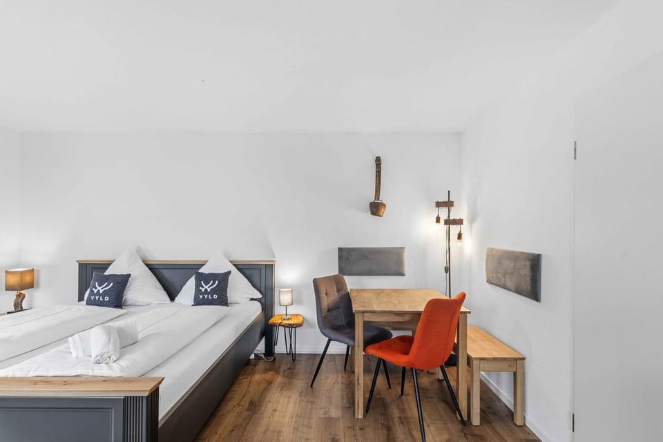 Bed, Seating area, Bedroom