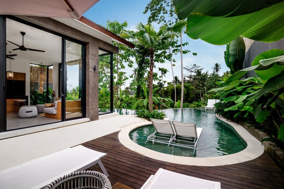 Property building, Seating area, Pool view, Swimming pool, sunbed
