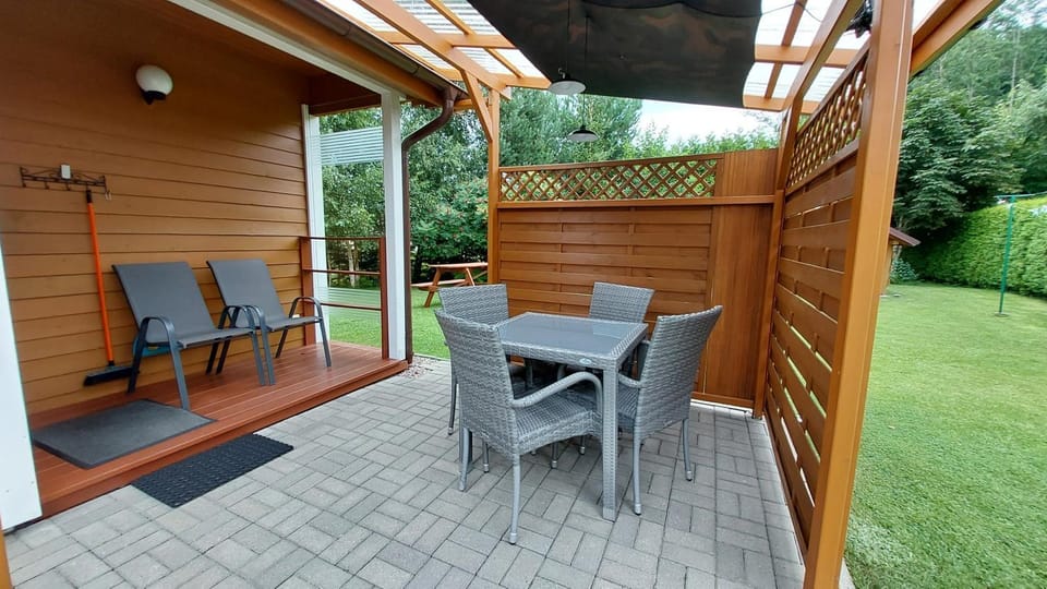 domek Drewniany na wiejskiej Campground/ 
RV Resort in Pomeranian Voivodeship