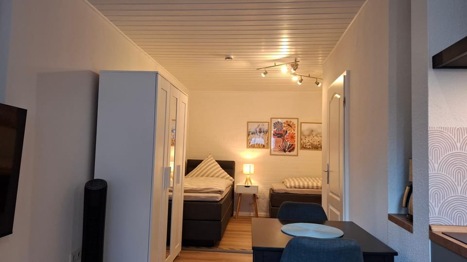 Bed, Dining area, wardrobe