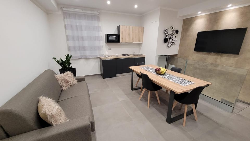 TV and multimedia, Kitchen or kitchenette, Living room, Seating area, Dining area, oven, stove