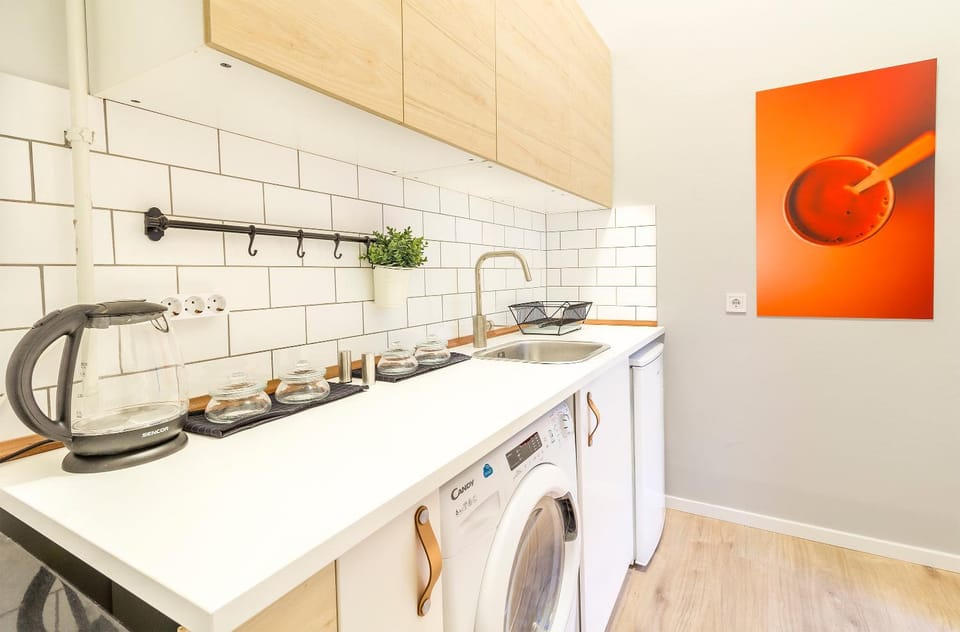 Kitchen or kitchenette, washing machine