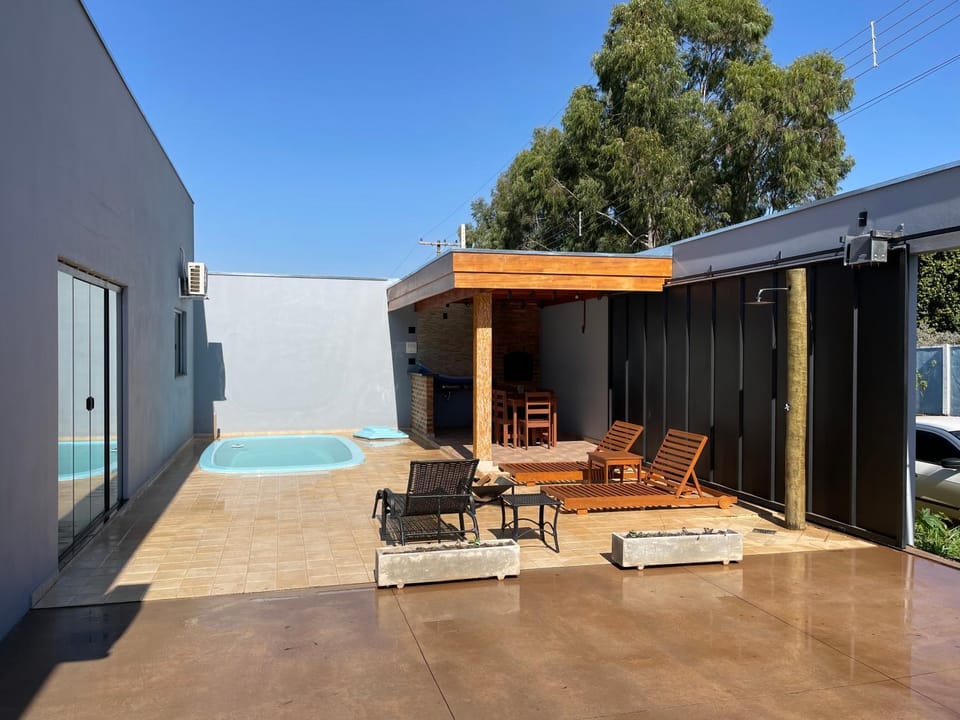 Property building, Pool view, Swimming pool, sunbed