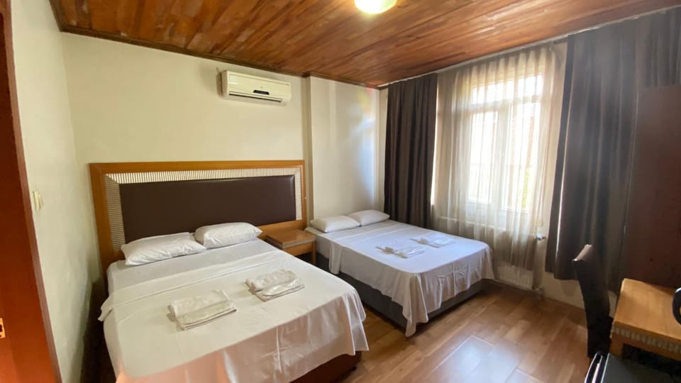 Bed, Photo of the whole room, Bedroom, towels, air conditioner