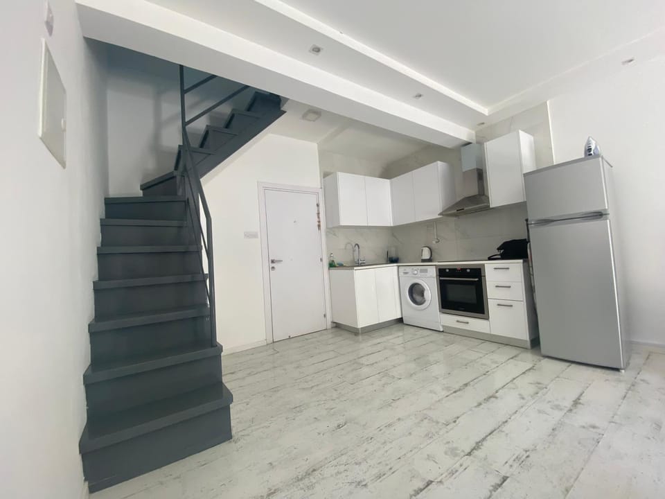 Kitchen or kitchenette, oven, stove