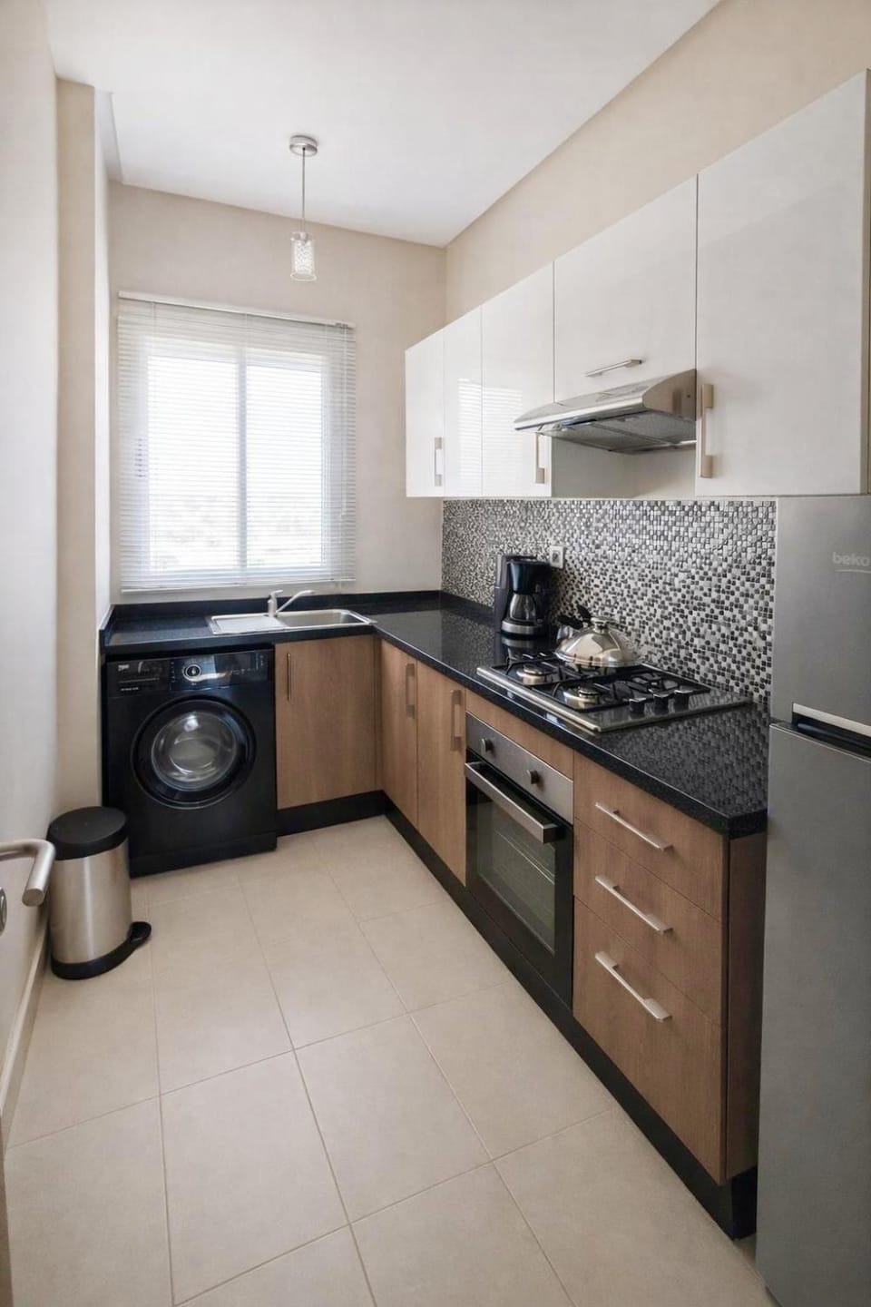 Kitchen or kitchenette, oven, stove, washing machine