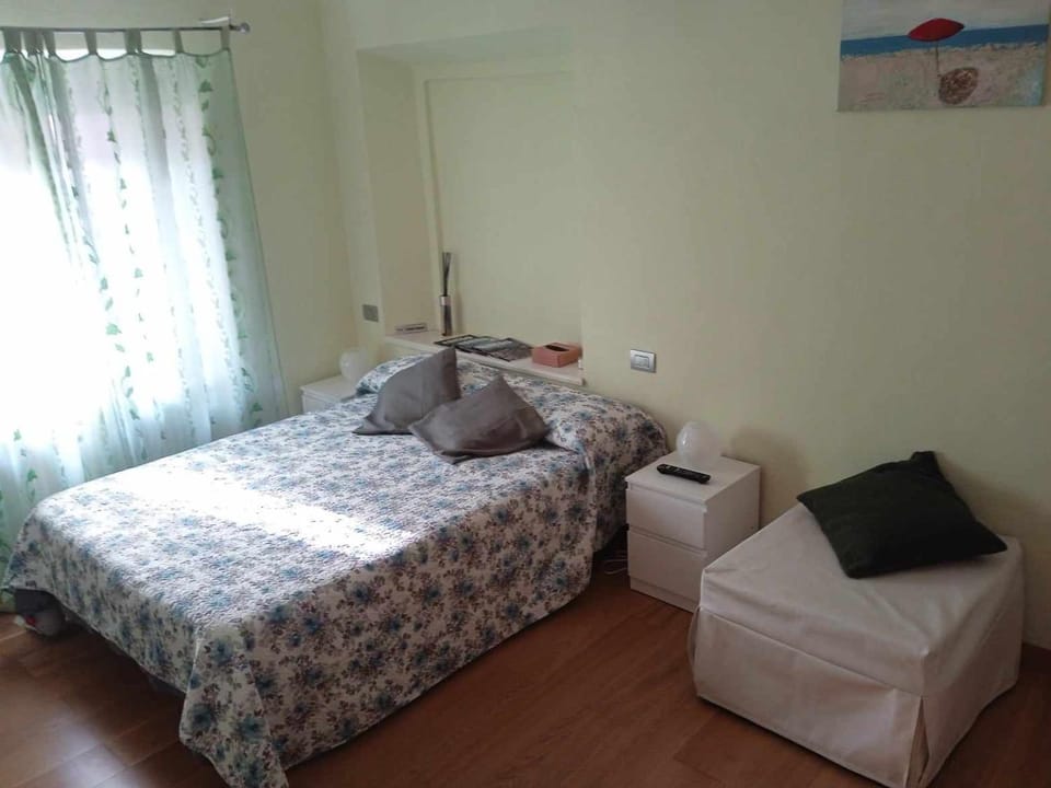 Bed, Bedroom, hair dryier, towels, air conditioner