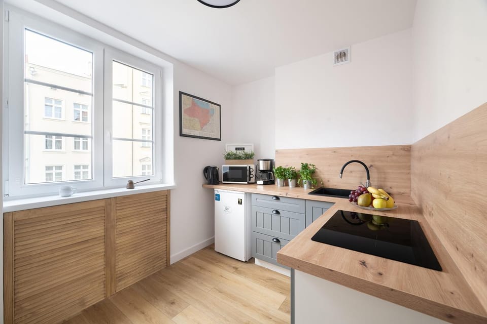Kitchen or kitchenette, microwave, stove, kitchen