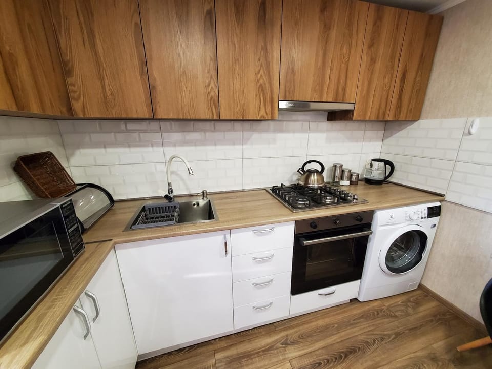 Coffee/tea facilities, Kitchen or kitchenette, minibar, stove, toaster, washing machine, dryer