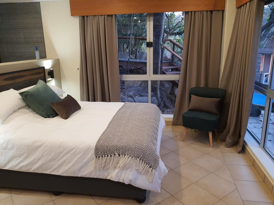 Bed, Seating area, Bedroom