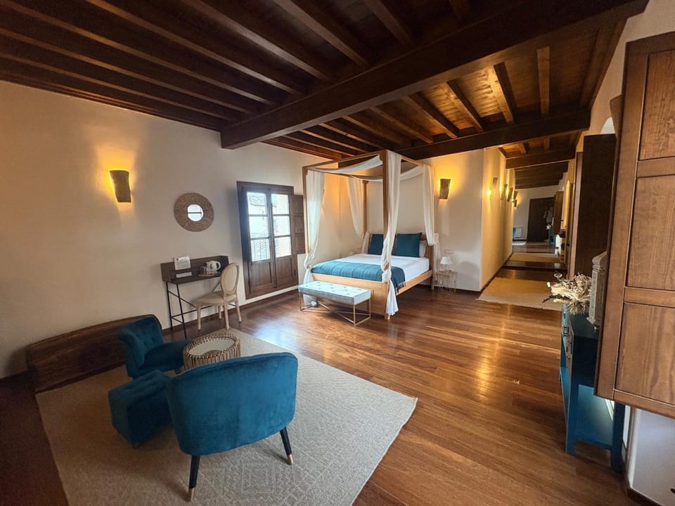 Bed, View (from property/room), View (from property/room), Living room, Photo of the whole room, Seating area, Bedroom, Garden view, Garden view, Landmark view, Landmark view, Sunrise, Sunset, Inner courtyard view, storage, towels, wardrobe