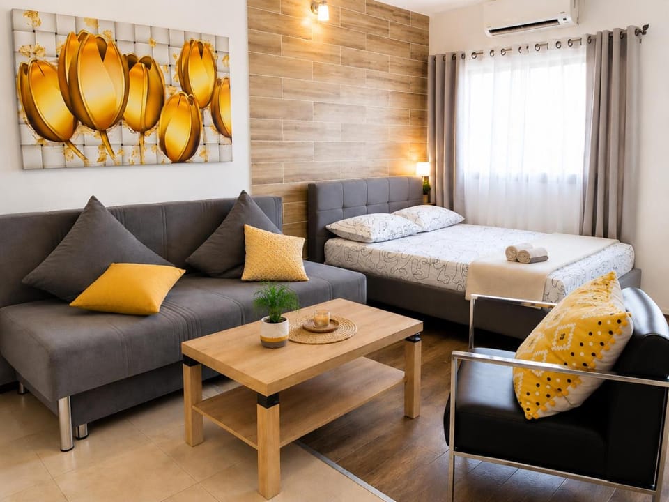 Bed, Living room, Seating area, Bedroom