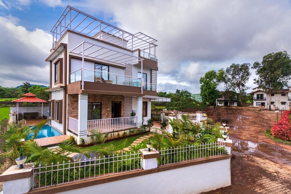 Property building, Facade/entrance, Balcony/Terrace, Garden view, Mountain view, Pool view, Swimming pool
