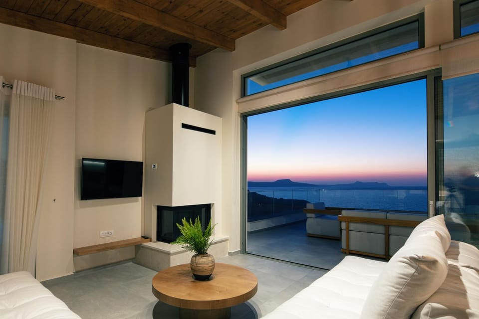 TV and multimedia, Living room, Seating area, Sea view, fireplace