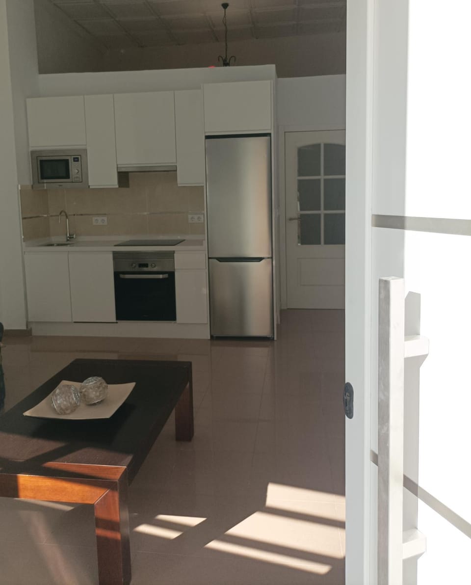 Kitchen or kitchenette, dishwasher, stove