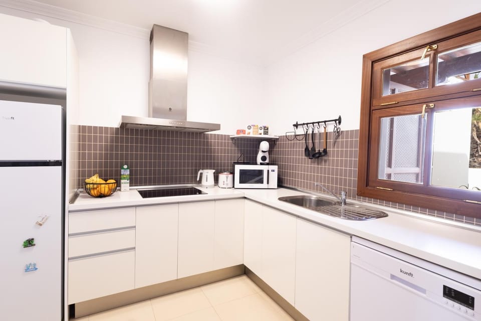 Kitchen or kitchenette, dishwasher, stove, kitchen