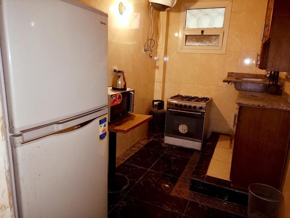 Kitchen or kitchenette, oven