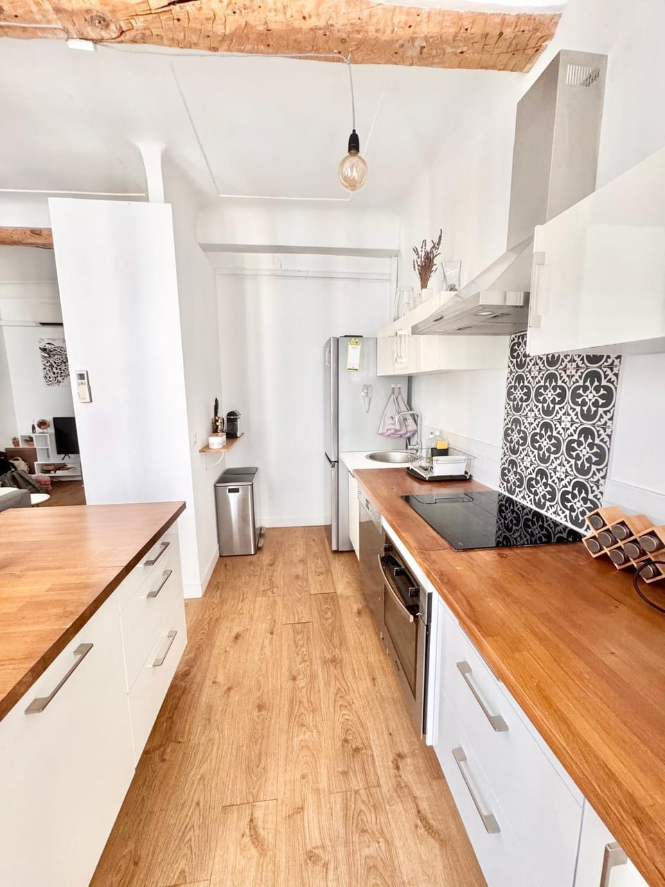 Kitchen or kitchenette, dishwasher, oven, stove