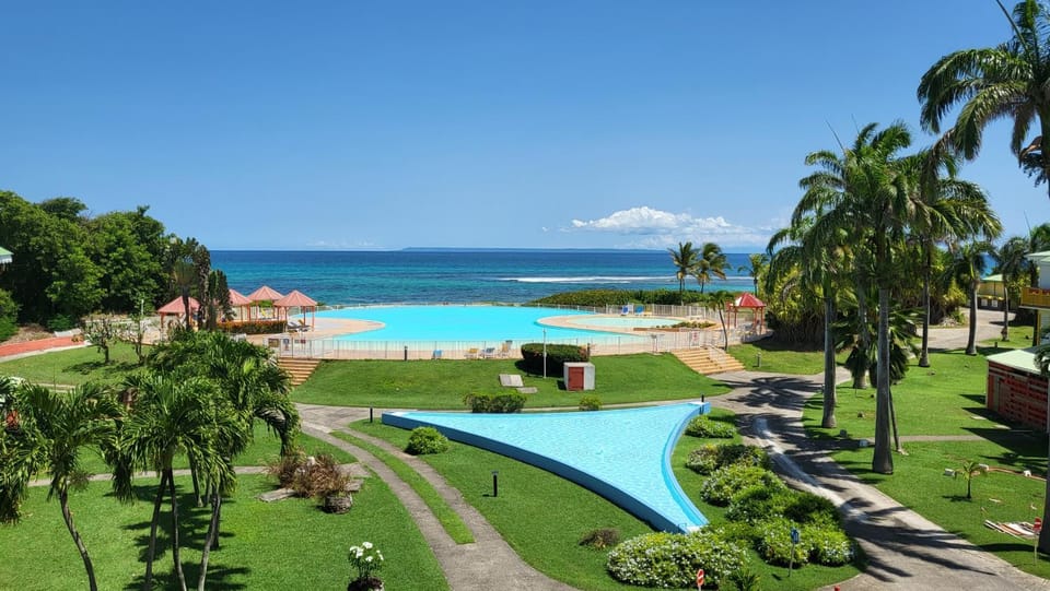 Patio, Natural landscape, Living room, Seating area, Dining area, Garden view, Pool view, Sea view, Swimming pool, sunbed