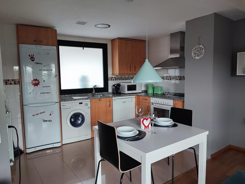 Kitchen or kitchenette, Dining area, dishwasher, oven, stove, toaster, washing machine, dryer