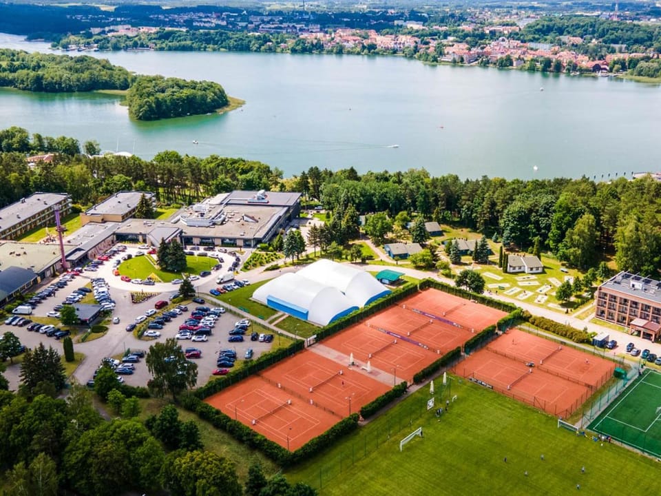 Property building, People, Activities, Bird's eye view, Bowling, Game Room, Garden, View (from property/room), Other, Tennis court, Guests, Lake view, Area and facilities, Sports, Entertainment, Family, Parking