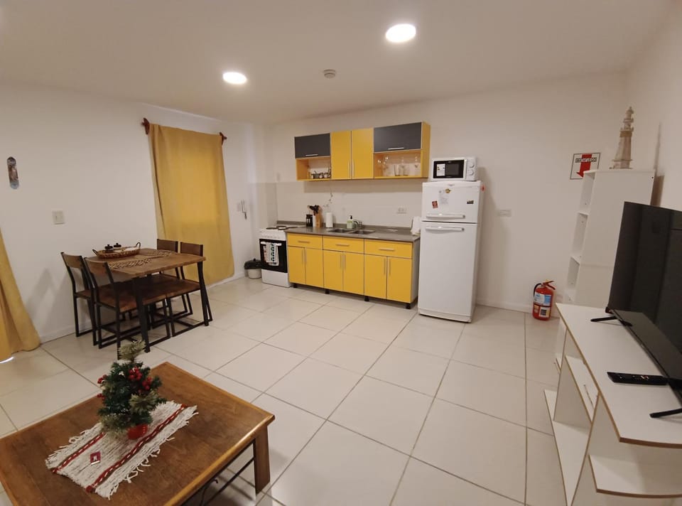 Communal lounge/ TV room, TV and multimedia, Dining area, furniture, microwave, oven, stove, kitchen