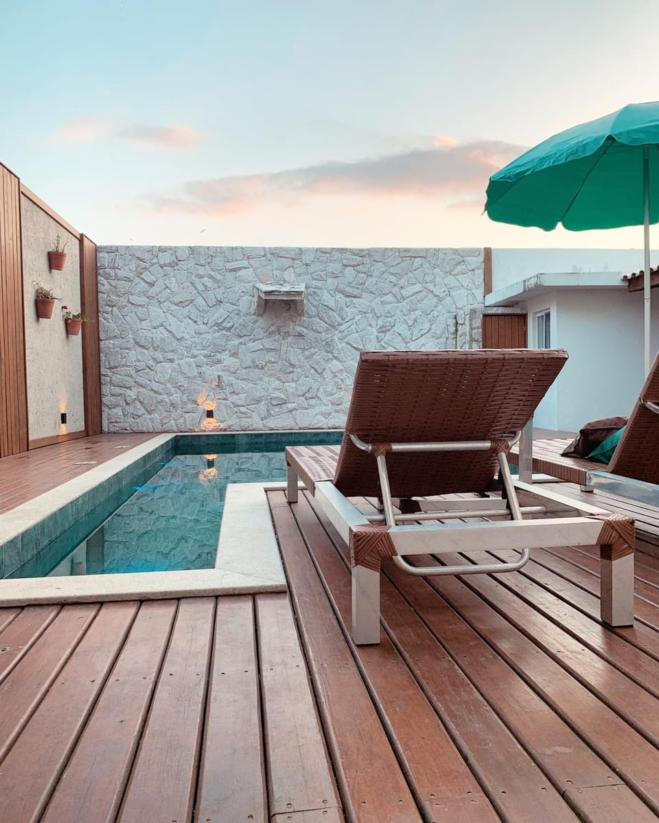 Casa com piscina em frente à Praia do Santinho House in Florianopolis