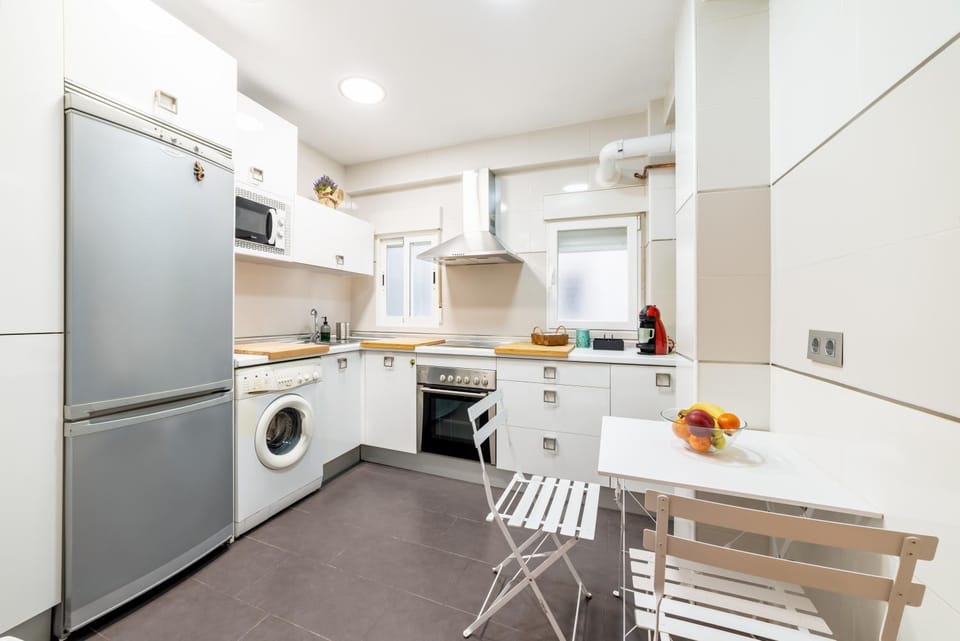 Dining area, minibar, washing machine, kitchen