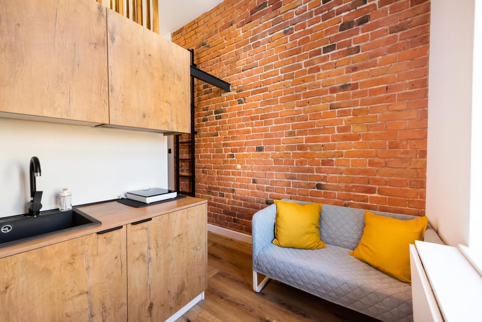 Kitchen or kitchenette, Living room, Seating area, Dining area