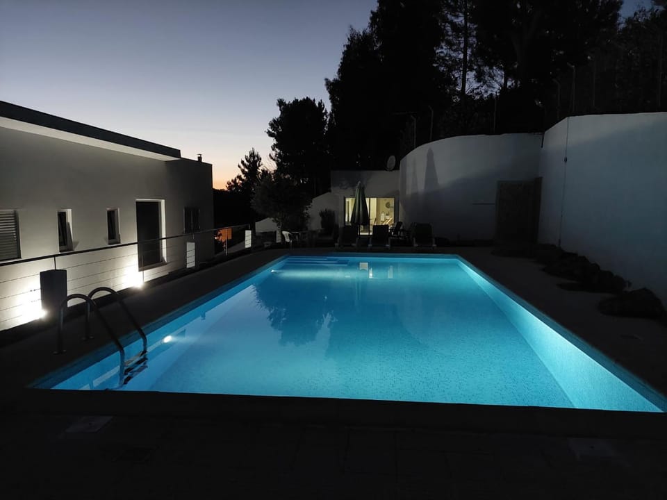 Property building, Night, Swimming pool
