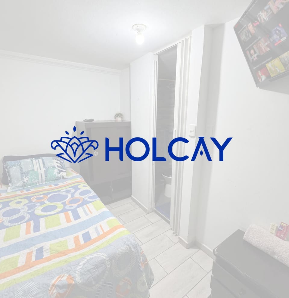 Bed, Property logo or sign, Photo of the whole room, Logo/Certificate/Sign, Bedroom, Text overlay, Certificate/Award
