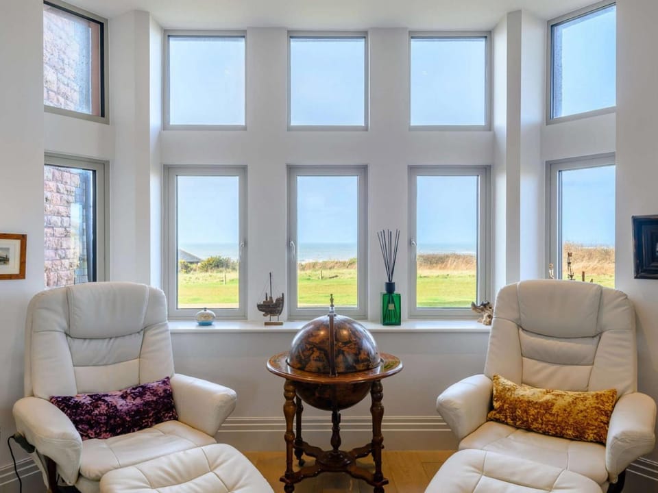 Living room, Seating area, Sea view
