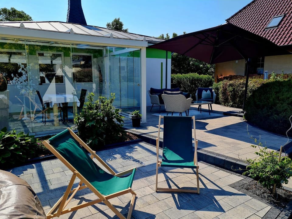 Property building, Patio, Garden, Garden view, sunbed