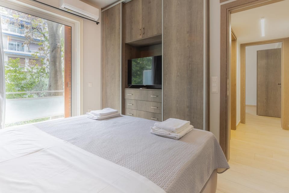 Bed, TV and multimedia, Bedroom, towels, wardrobe