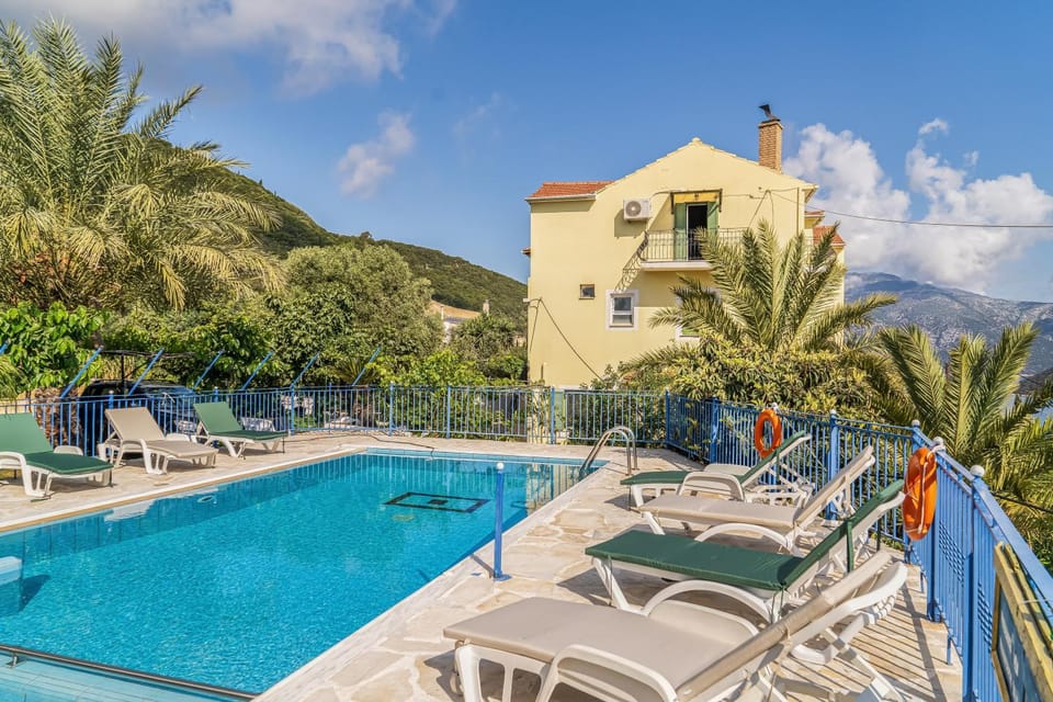 Property building, Living room, Swimming pool