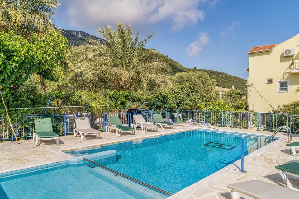 Property building, Living room, Swimming pool